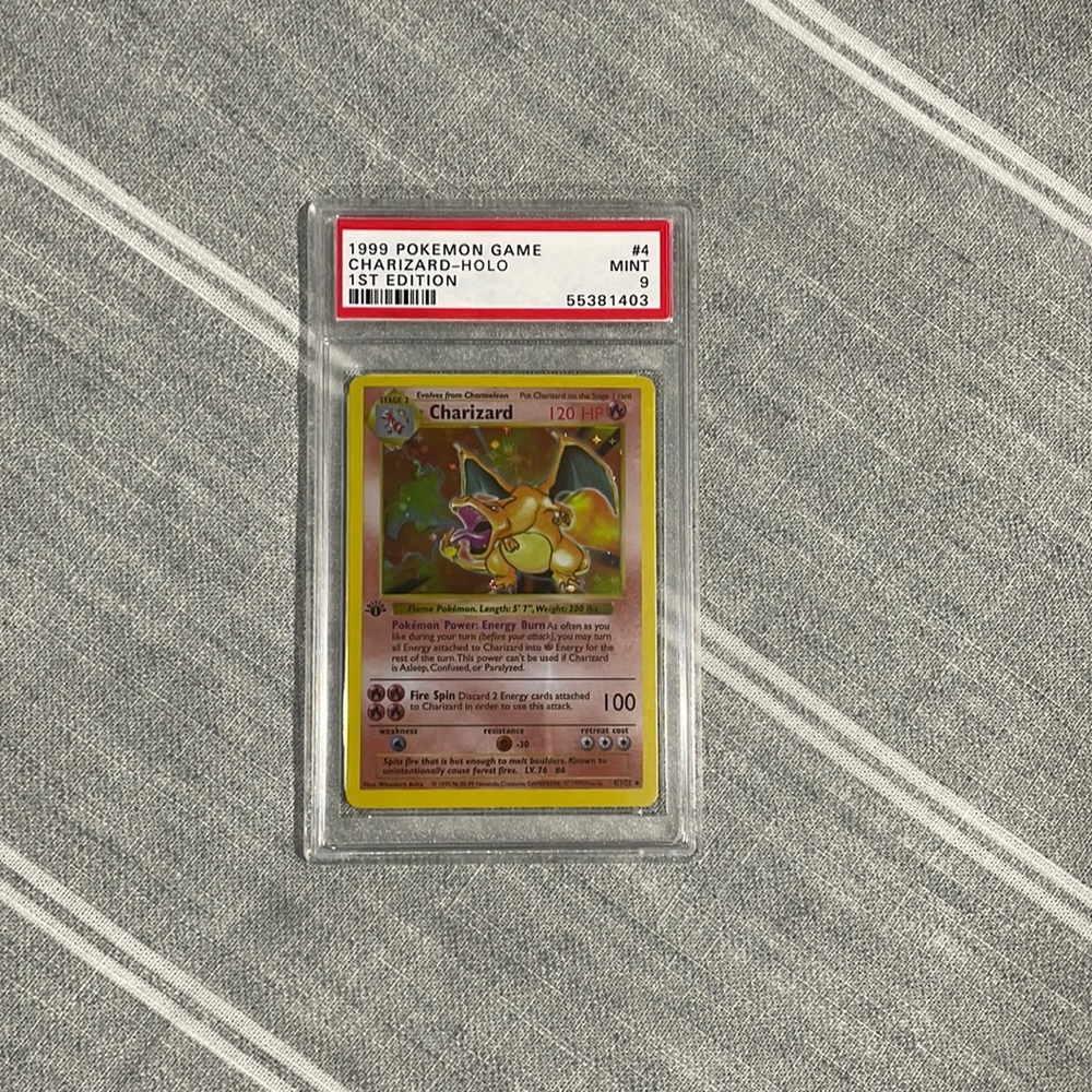 Collectors reproduction 1999 Base set Charizard 1st Edition Rated 9